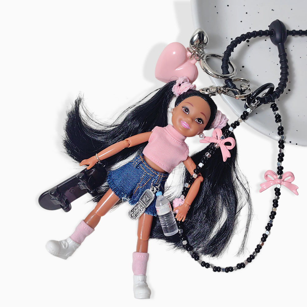 Luxury Bags Girls - Chaveiro de Boneca Menina Skatista com